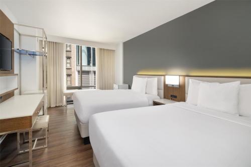 Habitación con 2 camas dobles - No fumadores del hotel Best Western Premier Empire State. Foto 1