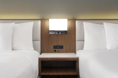 Habitación con 2 camas dobles - No fumadores del hotel Best Western Premier Empire State. Foto 2