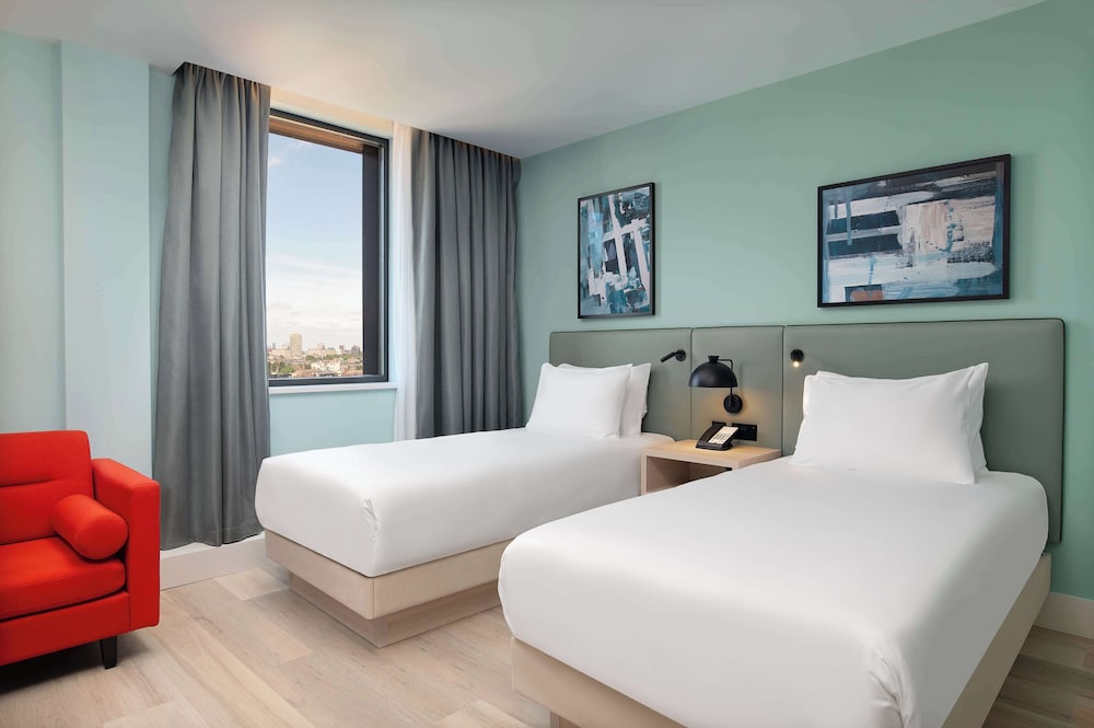 Habitación Deluxe, 2 camas individuales, vistas a la ciudad del hotel Hyatt Place London City East. Foto 1