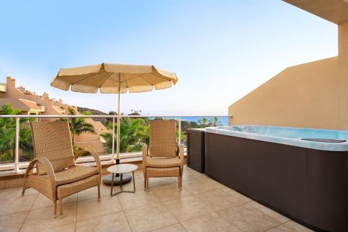 Apartamento Superior de 1 dormitorio con bañera de hidromasaje y vistas al mar del hotel Wyndham Residences Costa Adeje. Foto 1
