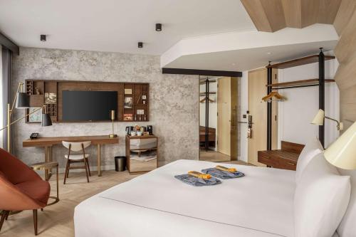 Suite Junior del hotel Canopy By Hilton London City. Foto 1