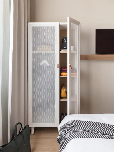 Habitación Clásica del hotel Okko Hotels Paris Gare De L'est. Foto 8