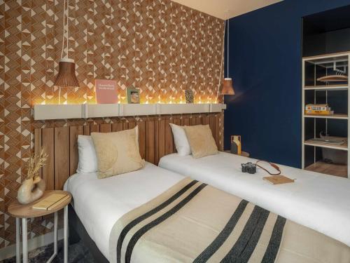 Habitación Doble Estándar - 2 camas del hotel Ibis Paris Gare Montparnasse Catalogne. Foto 2