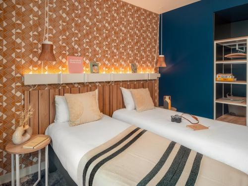 Habitación Doble Estándar - 2 camas del hotel Ibis Paris Gare Montparnasse Catalogne. Foto 7