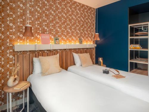 Habitación Doble Estándar - 2 camas del hotel Ibis Paris Gare Montparnasse Catalogne. Foto 12