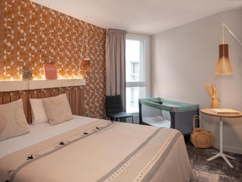 Habitación Doble Estándar del hotel Ibis Paris Gare Montparnasse Catalogne. Foto 11