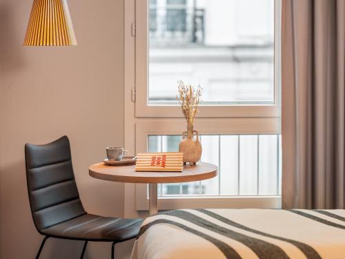 Habitación Doble Estándar del hotel Ibis Paris Gare Montparnasse Catalogne. Foto 13