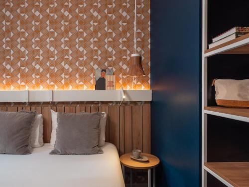 Habitación Doble Estándar del hotel Ibis Paris Gare Montparnasse Catalogne. Foto 14