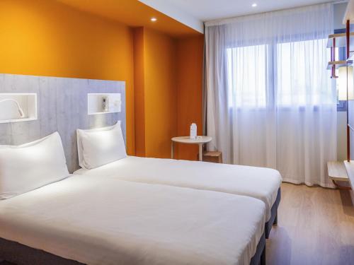 Habitación Doble Estándar - 2 camas del hotel ibis budget Huerta De Murcia. Foto 3