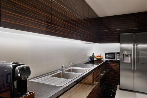 Palm Penthouse,1 King Bedroom and 1 Double Bedroom, Private Terrace Lounge, Beachfront Resort del hotel Marriott Resort Palm Jumeirah Dubai. Foto 16