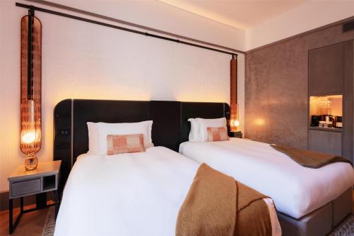 Habitación Doble Deluxe - 2 camas del hotel Hart Shoreditch Hotel London, Curio Collection by Hilton. Foto 1