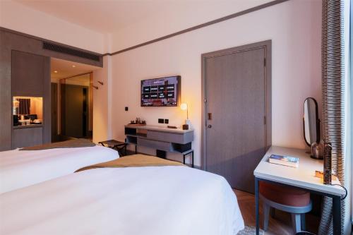 Habitación Doble Deluxe - 2 camas del hotel Hart Shoreditch Hotel London, Curio Collection by Hilton. Foto 4