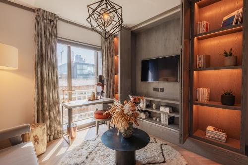 Suite Junior del hotel Hart Shoreditch Hotel London, Curio Collection by Hilton. Foto 1