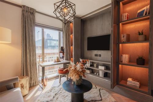 Suite Junior del hotel Hart Shoreditch Hotel London, Curio Collection by Hilton. Foto 3