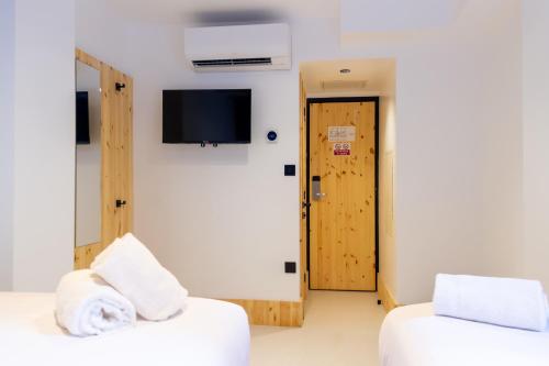 Habitación Triple con ventana del hotel easyHotel Paddington. Foto 2