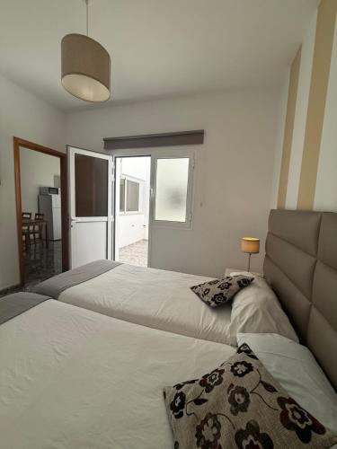 Apartamento Con Cocina Con Vistas Sofá Cama incluido 2 Camas individuales del hotel Apartamentos La Aldea Suites. Foto 2