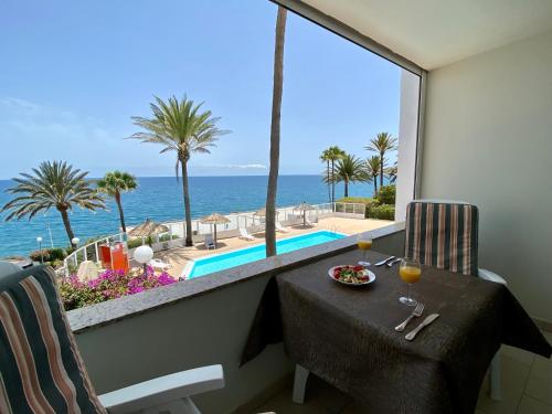 Apartamento Vista Mar Vista Piscina Balcón o Terraza Con Cocina 2 Camas individuales del hotel Ocean view apartments Las Flores I. Foto 2