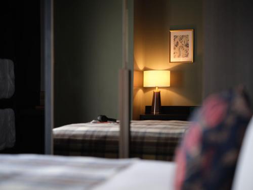 Habitación Club Atrium del hotel The Other House - South Kensington. Foto 2