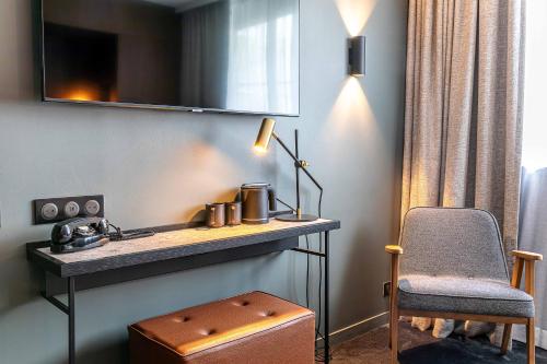 Habitación Doble Deluxe del hotel Le Bellune Paris. Foto 1