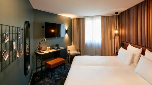 Habitación Doble Deluxe del hotel Le Bellune Paris. Foto 2
