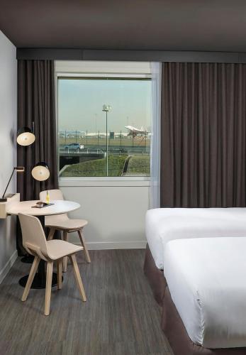 Habitación Doble The INNSiDE - 2 camas del hotel INNSiDE by Meliá Paris Charles de Gaulle Airport. Foto 1