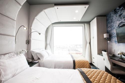 Habitación Premium - 2 camas dobles del hotel Wyndham Garden Brooklyn Sunset Park. Foto 7