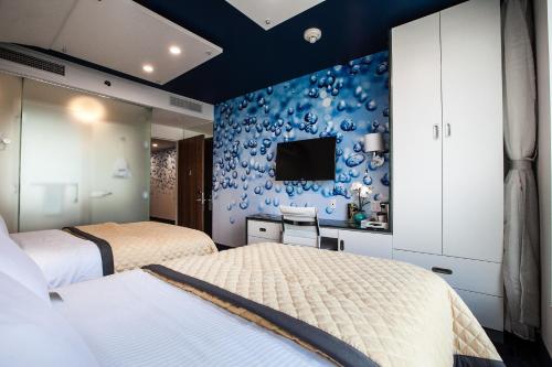 Habitación Cuádruple Superior del hotel Wyndham Garden Brooklyn Sunset Park