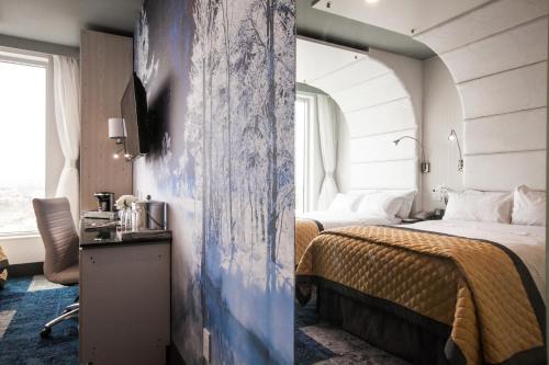 Habitación Cuádruple Deluxe del hotel Wyndham Garden Brooklyn Sunset Park. Foto 2