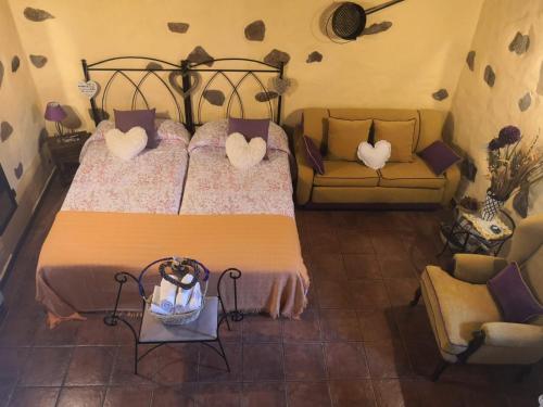 Casa Balcón o Terraza Con Cocina 1 habitación Con Vistas 2 Camas individuales 1 Cama doble del hotel Finca Naturacanaria. Foto 1