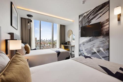 Habitación Doble Deluxe - 2 camas del hotel Riu Plaza London Victoria. Foto 2