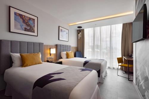Habitación Doble Deluxe - 2 camas del hotel Riu Plaza London Victoria. Foto 3