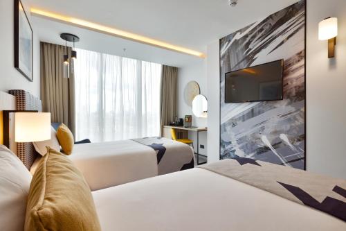 Habitación Doble Deluxe - 2 camas del hotel Riu Plaza London Victoria. Foto 4