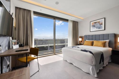 Habitación Deluxe con cama grande del hotel Riu Plaza London Victoria