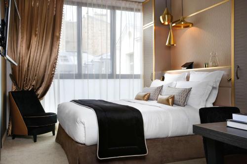 Habitación Deluxe - 1 cama grande del hotel Niepce Paris , Curio Collection By Hilton