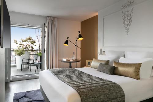 Dúplex Roofs of Paris del hotel La Clef Champs-Élysées Paris By The Crest Collection. Foto 3