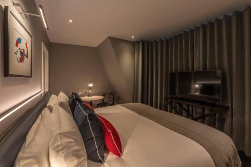 Habitación con 1 cama extragrande o 2 individuales del hotel The Resident Covent Garden. Foto 3