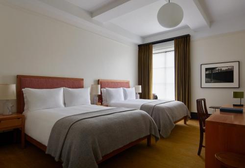 Habitación Dual con 1 cama grande del hotel Nine Orchard. Foto 3