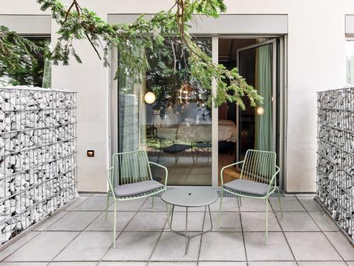 Bassline Courtyard Terrace Room del hotel Jaz In The City Vienna. Foto 2