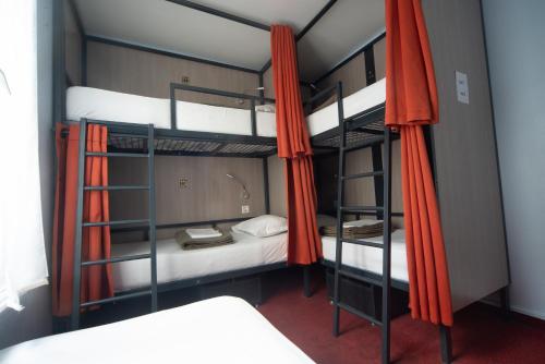 Litera en habitación compartida - Solo mujeres del hotel City Inn Paris. Foto 6