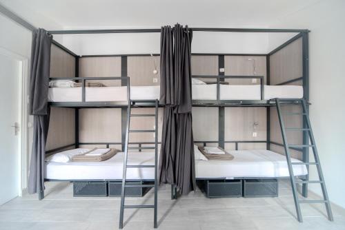 Litera en habitación compartida - Solo mujeres del hotel City Inn Paris. Foto 9