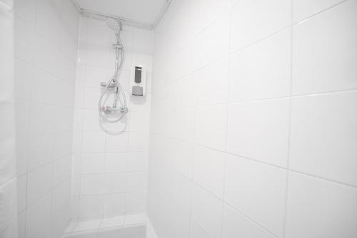 Litera en habitación compartida - Solo mujeres del hotel City Inn Paris. Foto 10