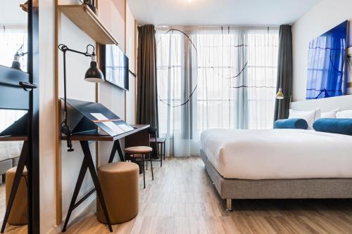 Habitación Deluxe del hotel Le Grand Quartier. Foto 4