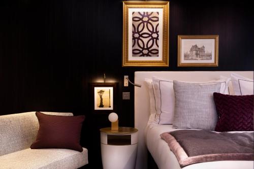 Habitación Boutique con vistas a la Torre Eiffel del hotel Le Damantin and Spa. Foto 1