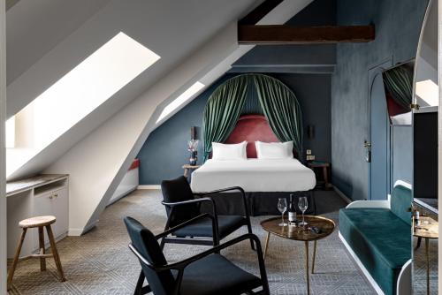 Suite Junior - Parisian Eaves del hotel Grands Boulevards Experimental. Foto 18