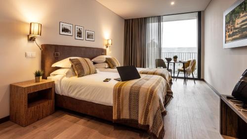 Habitación Doble Estándar con balcón - 1 o 2 camas del hotel Évora O Cante. Foto 1