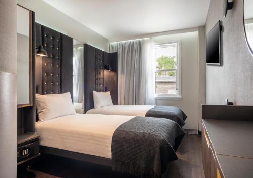 Alojamiento Doble Acogedor con ventana - 2 camas del hotel Point A Kensington Olympia. Foto 2
