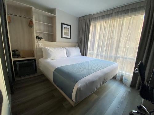 Habitación - 1 cama extragrande - No fumadores del hotel Wingate by Wyndham New York Midtown South/5th Ave. Foto 6