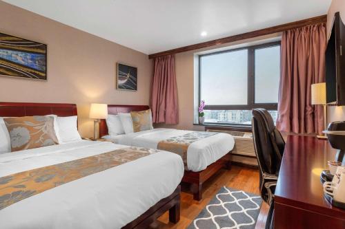 Habitación Doble con 2 camas dobles - No fumadores del hotel The L. Foto 3