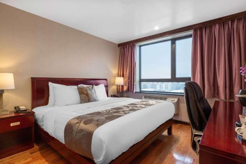 Habitación con cama extragrande y vistas a la ciudad - No fumadores del hotel The L. Foto 1