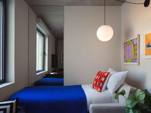 Habitación Sleeper - 1 cama grande del hotel Penny Williamsburg. Foto 6